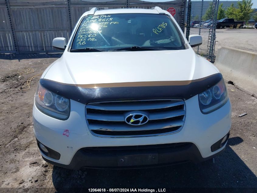 2012 Hyundai Santa Fe Se VIN: 5XYZHDAGXCG099735 Lot: 12064618