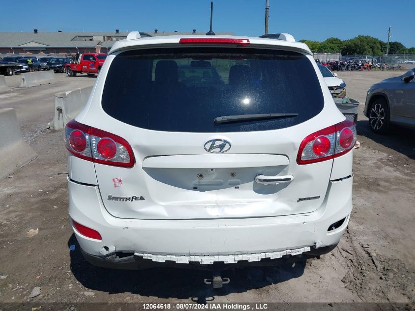 2012 Hyundai Santa Fe Se VIN: 5XYZHDAGXCG099735 Lot: 12064618