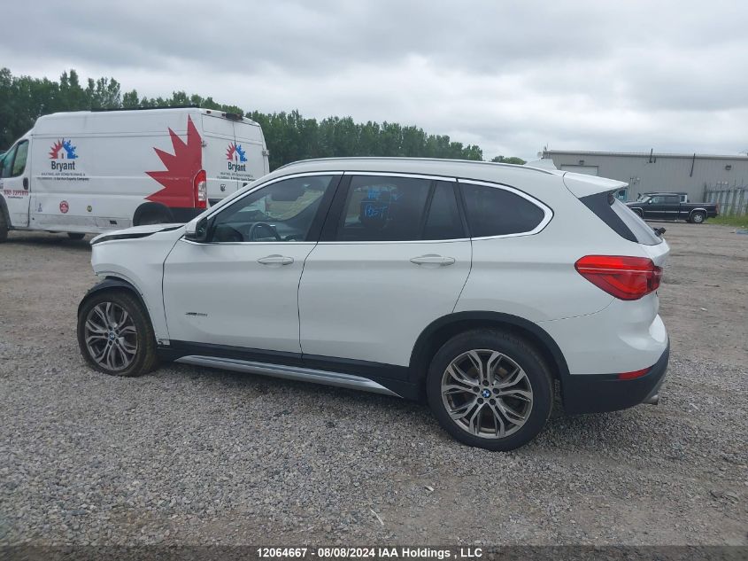 2018 BMW X1 VIN: WBXHT3C33J5F89735 Lot: 12064667