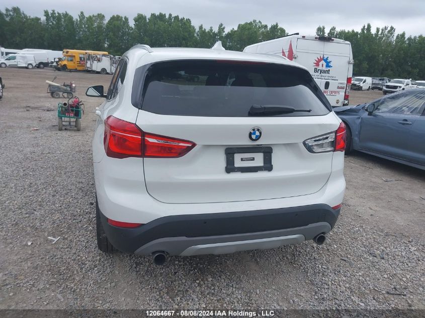 2018 BMW X1 VIN: WBXHT3C33J5F89735 Lot: 12064667