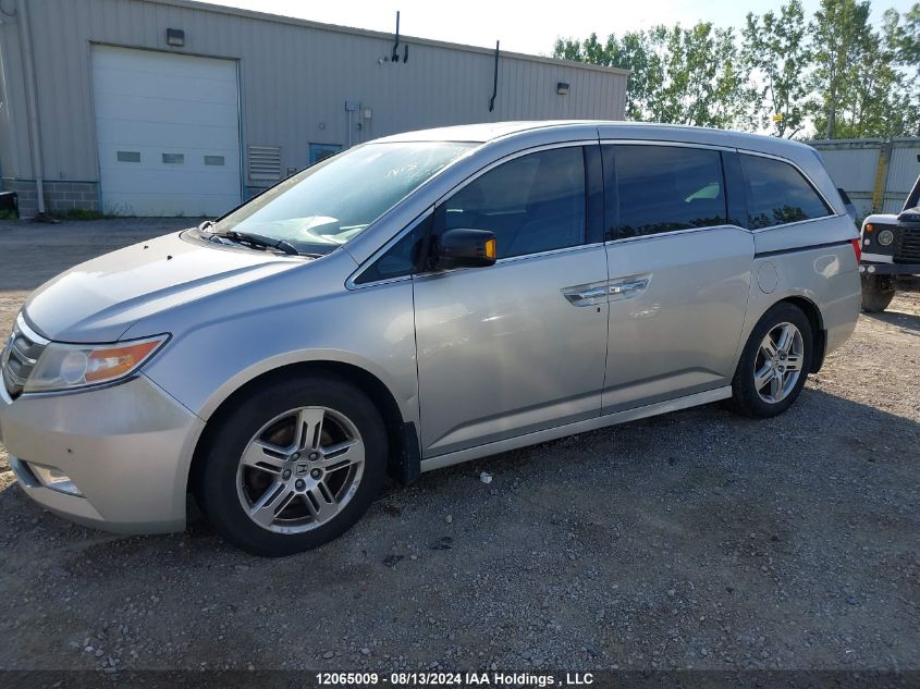 2012 Honda Odyssey VIN: 5FNRL5H9XCB507461 Lot: 12065009