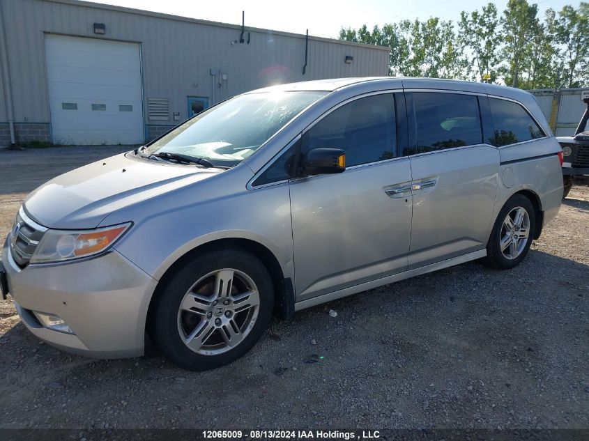 2012 Honda Odyssey VIN: 5FNRL5H9XCB507461 Lot: 12065009