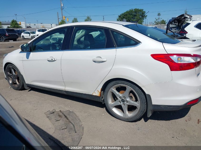 2012 Ford Focus Titanium VIN: 1FAHP3J2XCL368551 Lot: 12065287