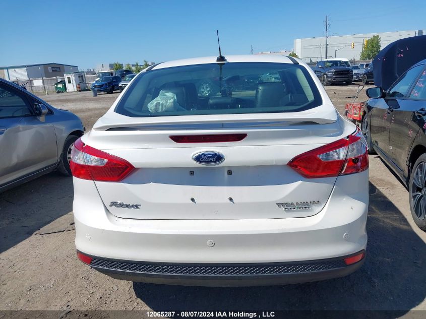 2012 Ford Focus Titanium VIN: 1FAHP3J2XCL368551 Lot: 12065287