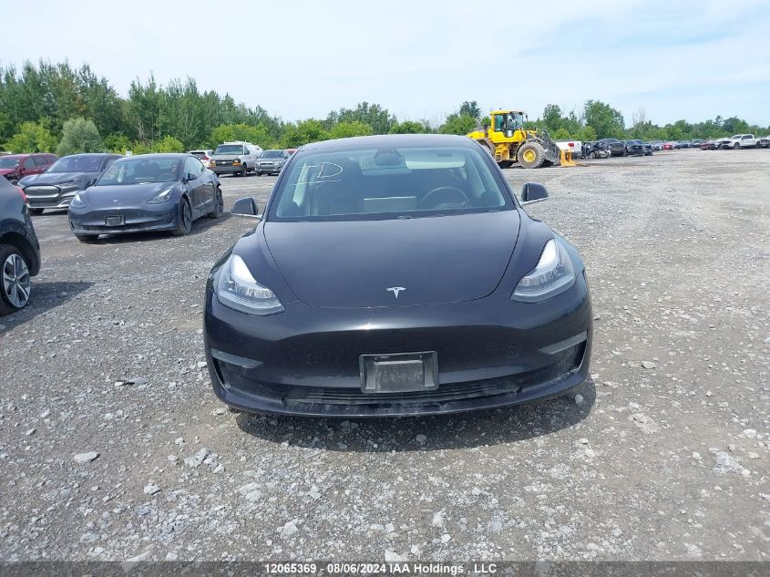 2018 Tesla Model 3 VIN: 5YJ3E1EB9JF110028 Lot: 12065369