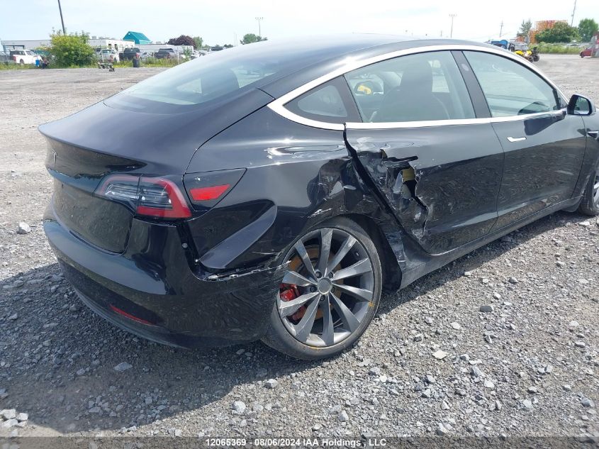 2018 Tesla Model 3 VIN: 5YJ3E1EB9JF110028 Lot: 12065369