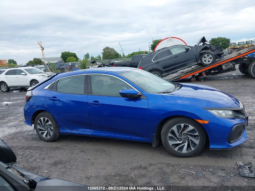 2018 Honda Civic Hatchback VIN: SHHFK7H21JU306564 Lot: 12065372