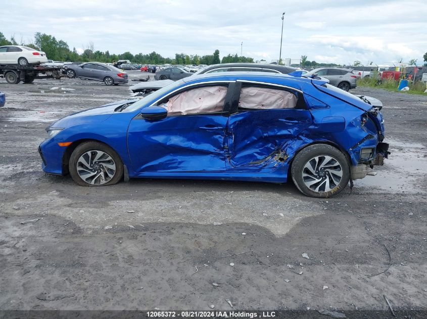 2018 Honda Civic Hatchback VIN: SHHFK7H21JU306564 Lot: 12065372