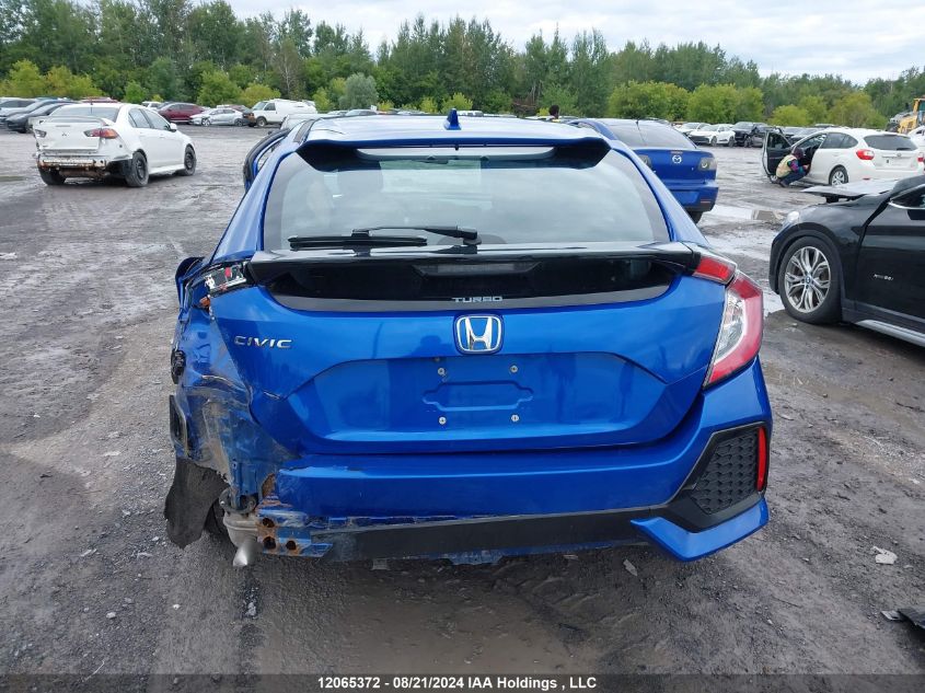 2018 Honda Civic Hatchback VIN: SHHFK7H21JU306564 Lot: 12065372