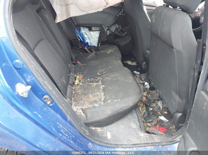 2018 Honda Civic Hatchback VIN: SHHFK7H21JU306564 Lot: 12065372