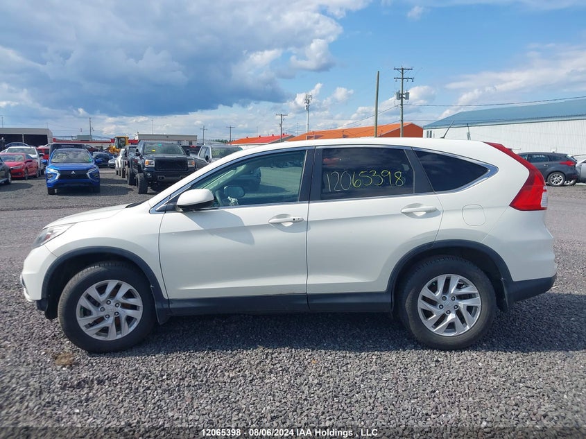 2015 Honda Cr-V VIN: 2HKRM4H58FH130851 Lot: 12065398