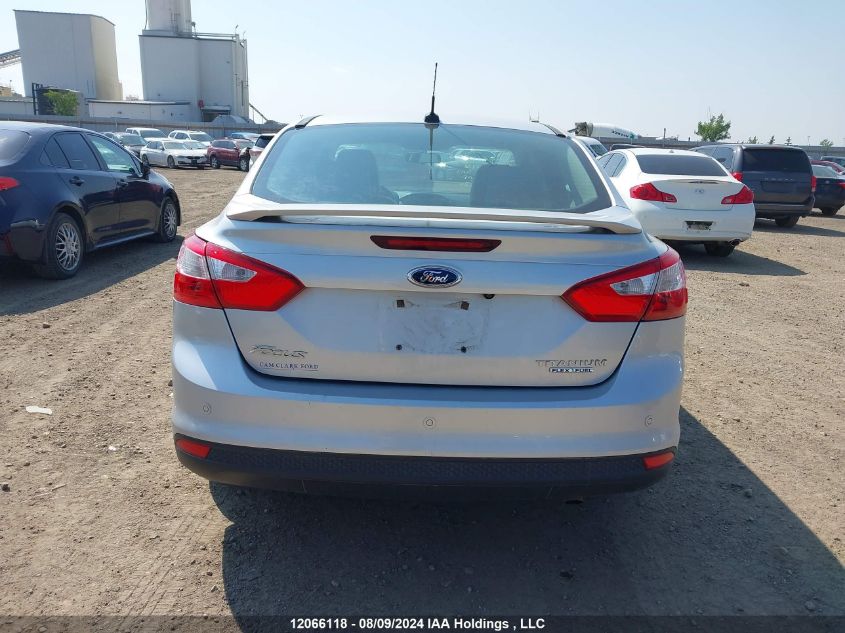 2013 Ford Focus Titanium VIN: 1FADP3J23DL366012 Lot: 12066118