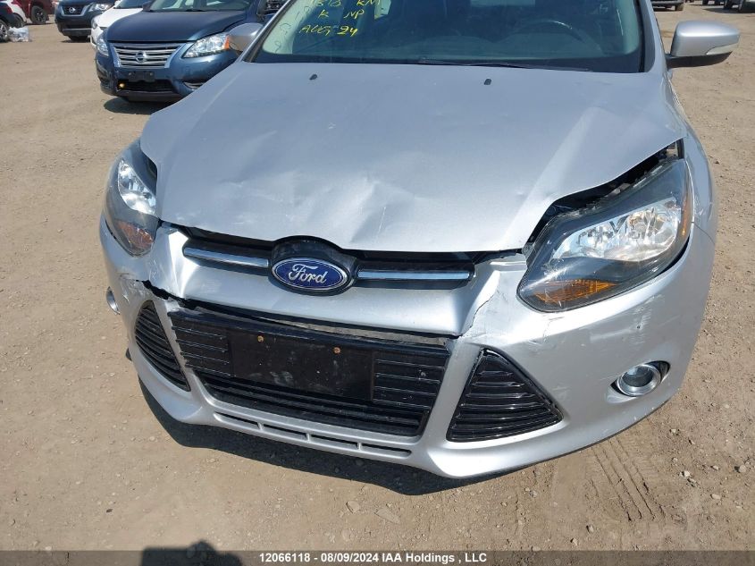 2013 Ford Focus Titanium VIN: 1FADP3J23DL366012 Lot: 12066118