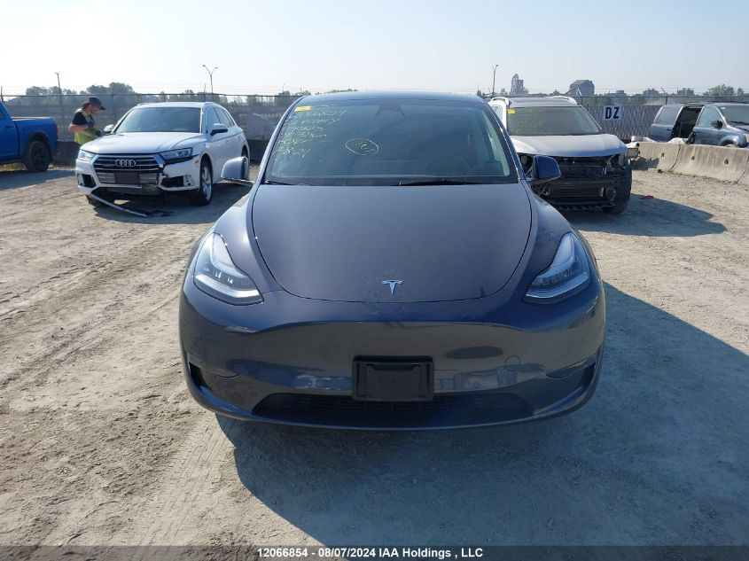 2022 Tesla Model Y VIN: 7SAYGAEE5NF508615 Lot: 12066854