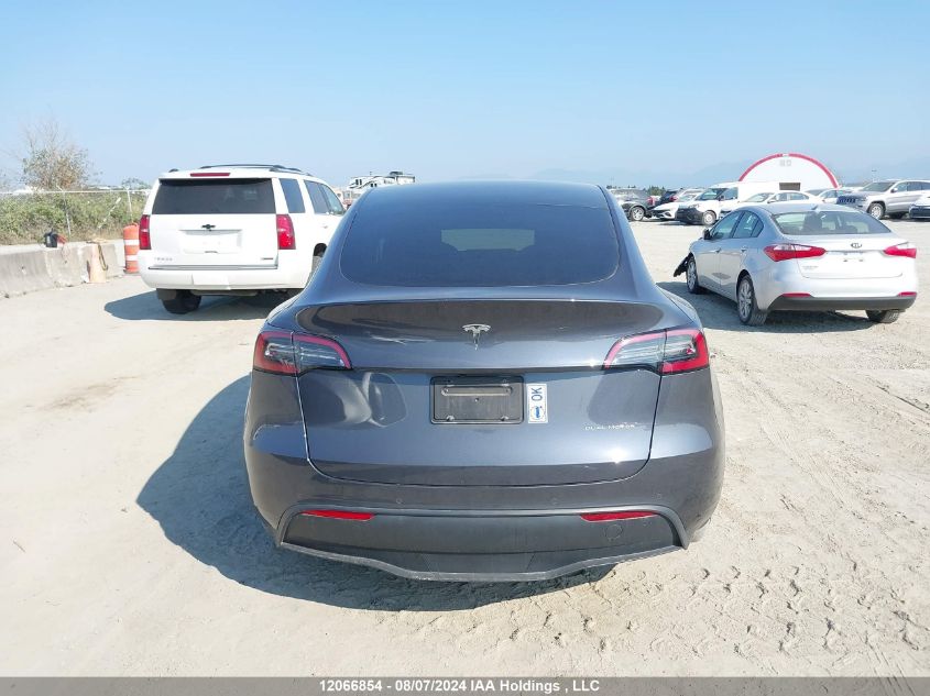 2022 Tesla Model Y VIN: 7SAYGAEE5NF508615 Lot: 12066854