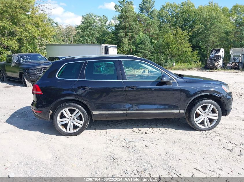 2014 Volkswagen Touareg Tdi VIN: WVGEP9BP7ED009094 Lot: 12067164