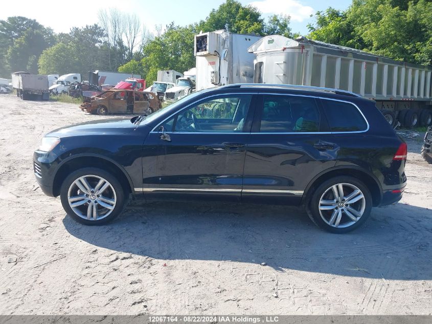 2014 Volkswagen Touareg Tdi VIN: WVGEP9BP7ED009094 Lot: 12067164