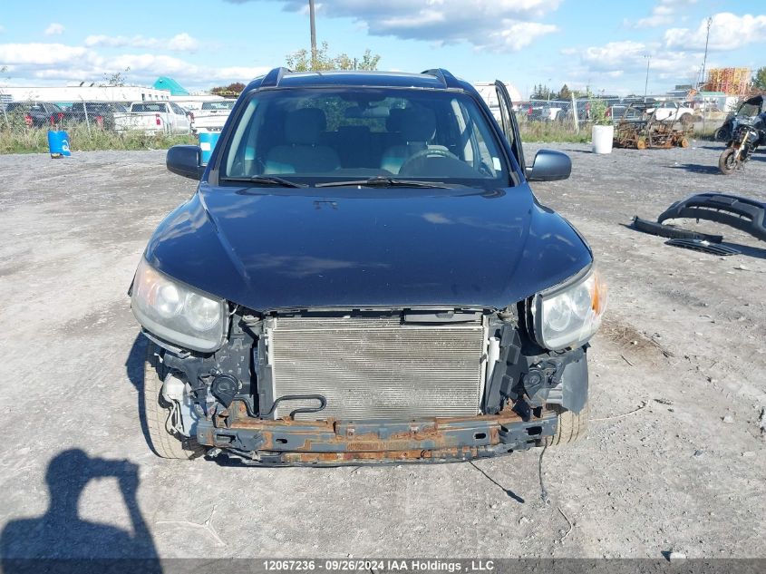 2012 Hyundai Santa Fe VIN: 5XYZGDAG8CG117832 Lot: 12067236