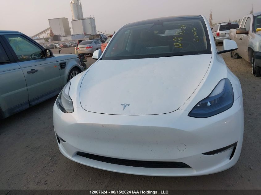 2023 Tesla Model Y VIN: LRWYGDEEXPC009949 Lot: 12067624