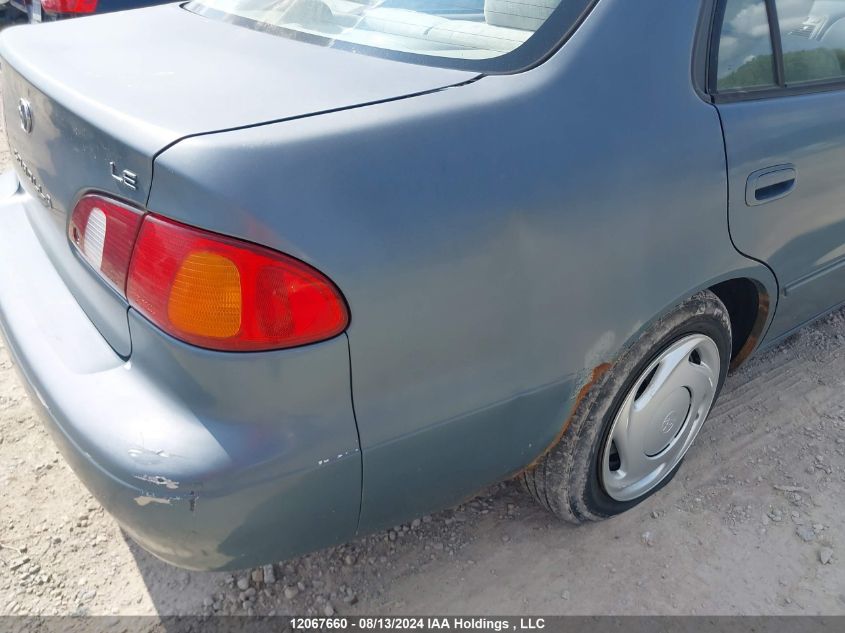 1998 Toyota Corolla Ve/Ce/Le VIN: 2T1BR12E6WC712704 Lot: 12067660