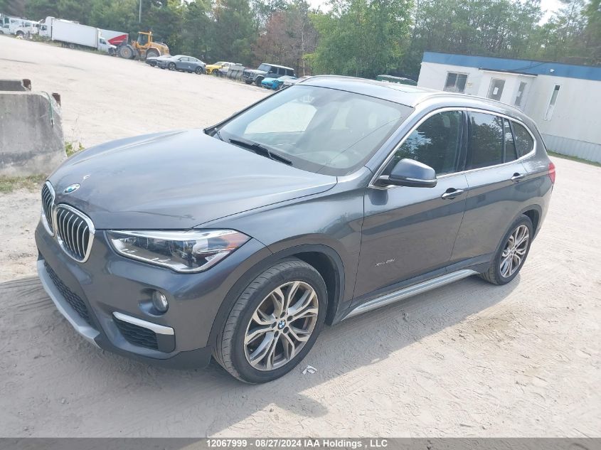 WBXHT3C38G5E54307 2016 BMW X1 - Image 2