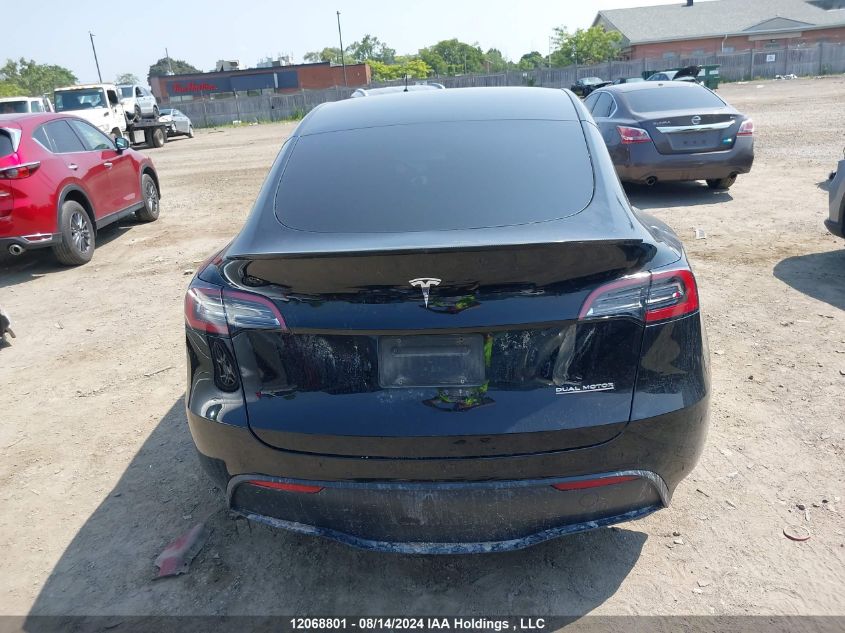 2022 Tesla Model Y VIN: 7SAYGDEF0NF451928 Lot: 12068801