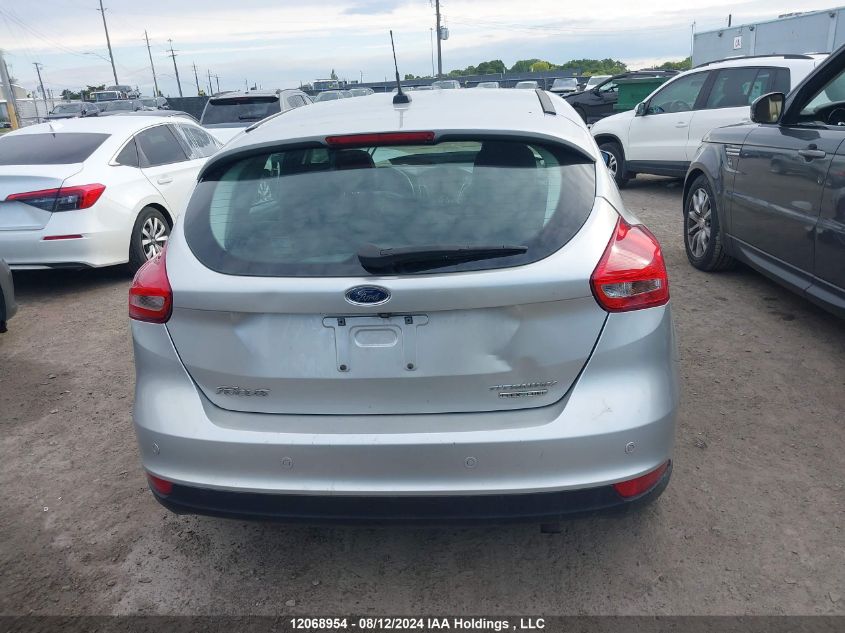 2016 Ford Focus Titanium VIN: 1FADP3N29GL206571 Lot: 12068954