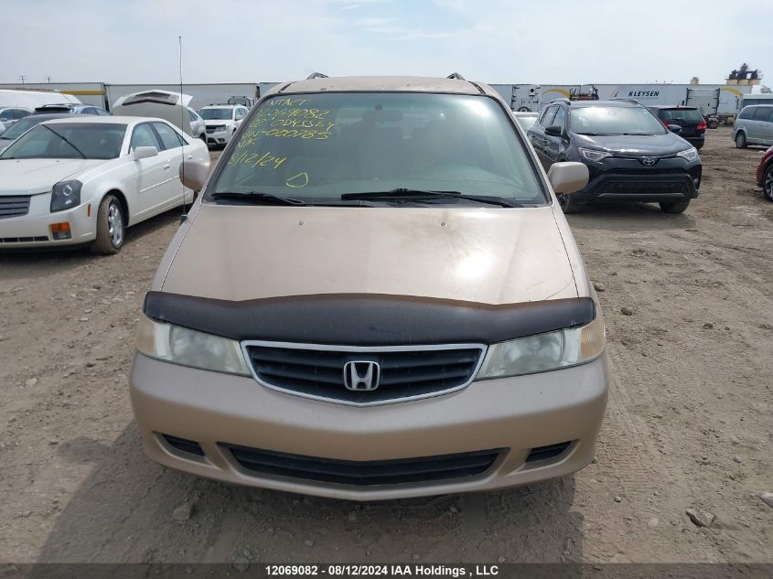 2002 Honda Odyssey VIN: 2HKRL18992H000785 Lot: 12069082