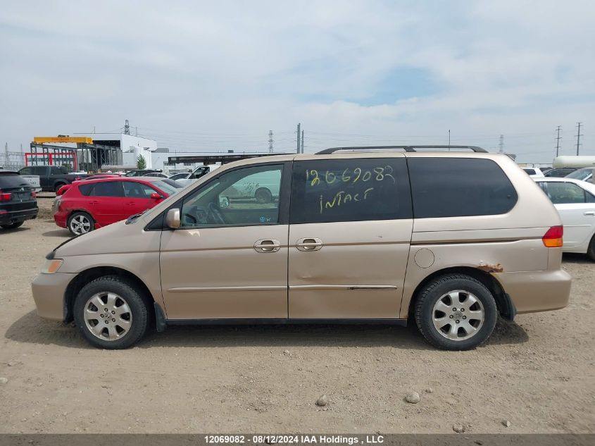 2002 Honda Odyssey VIN: 2HKRL18992H000785 Lot: 12069082