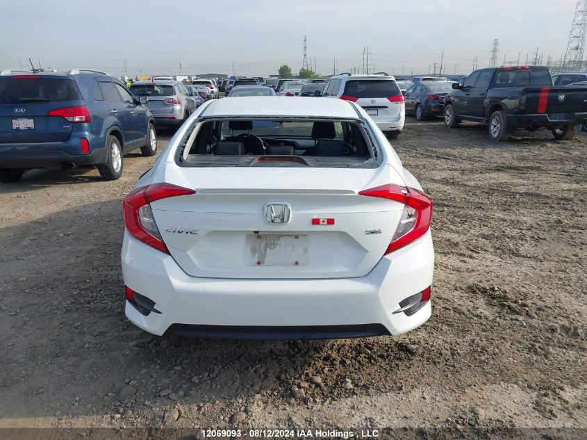 2018 Honda Civic Sedan VIN: 2HGFC2F65JH040338 Lot: 12069093