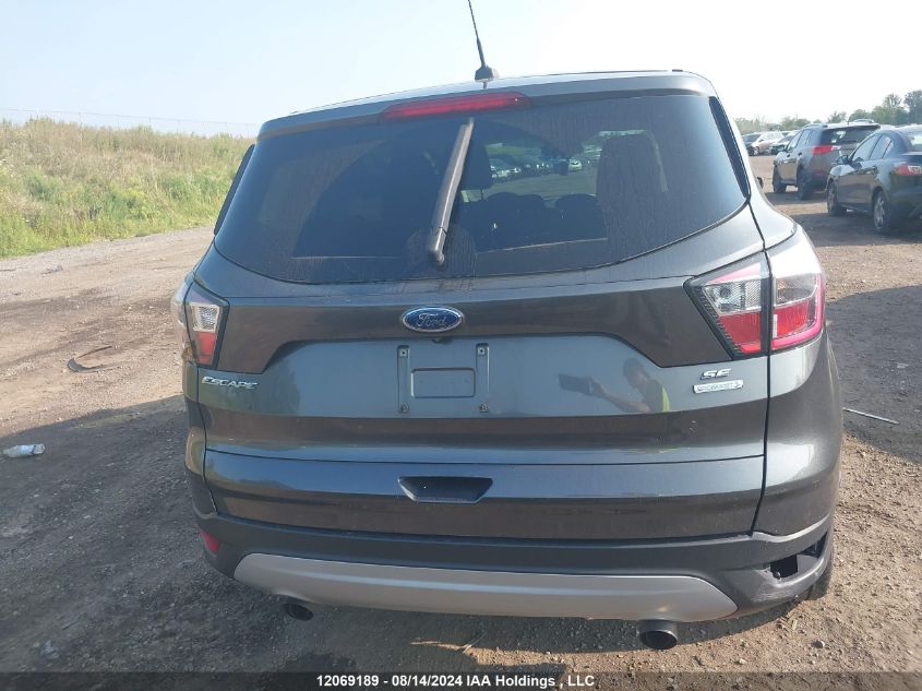 2017 Ford Escape Se VIN: 1FMCU0GDXHUA97718 Lot: 12069189