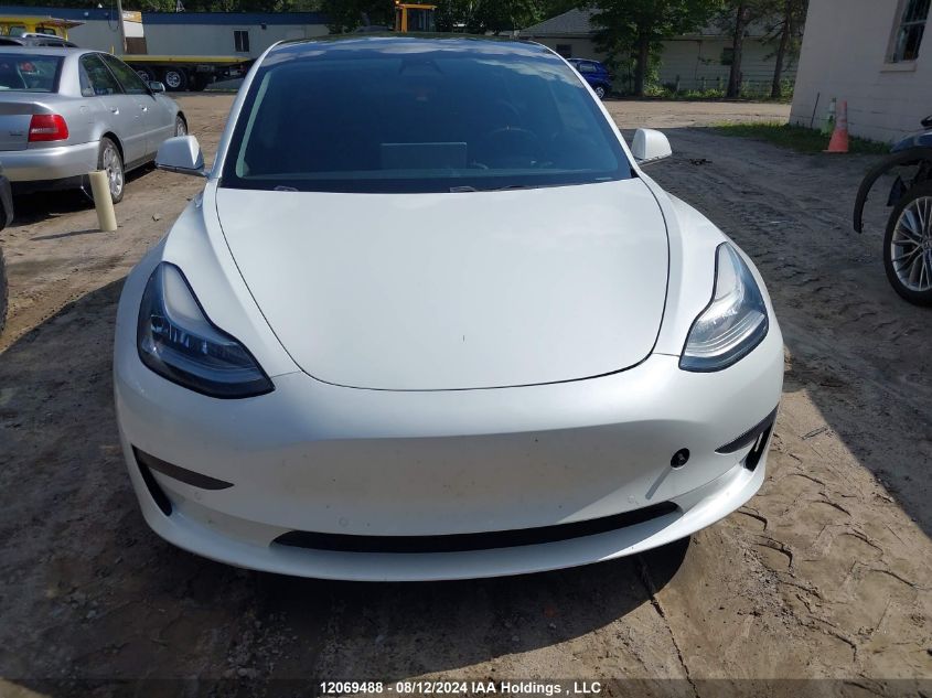 2019 Tesla Model 3 VIN: 5YJ3E1EAXKF447610 Lot: 12069488