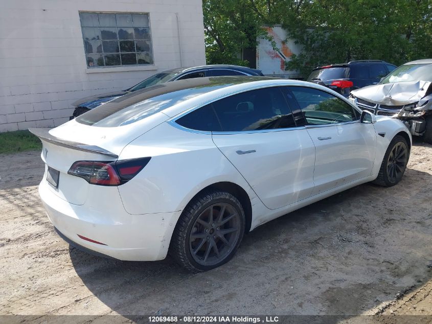 2019 Tesla Model 3 VIN: 5YJ3E1EAXKF447610 Lot: 12069488