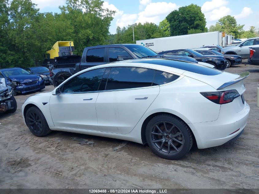 2019 Tesla Model 3 VIN: 5YJ3E1EAXKF447610 Lot: 12069488