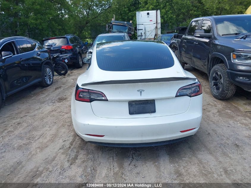 2019 Tesla Model 3 VIN: 5YJ3E1EAXKF447610 Lot: 12069488