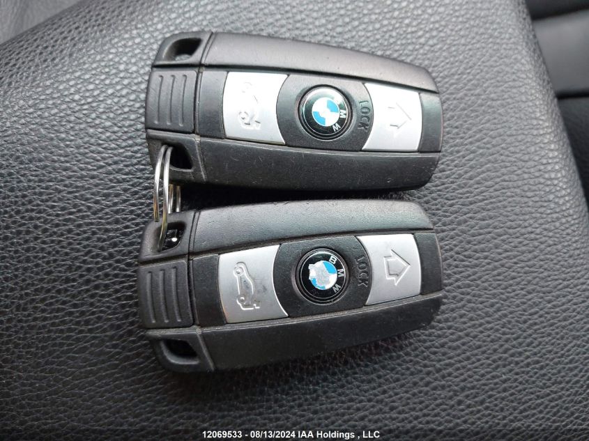 2007 BMW 3 Series VIN: WBAVC93527KZ71148 Lot: 12069533