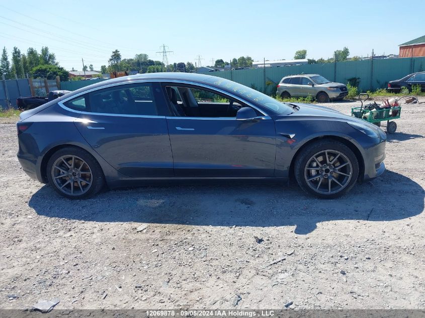 2020 Tesla Model 3 VIN: 5YJ3E1EA7LF703851 Lot: 12069878