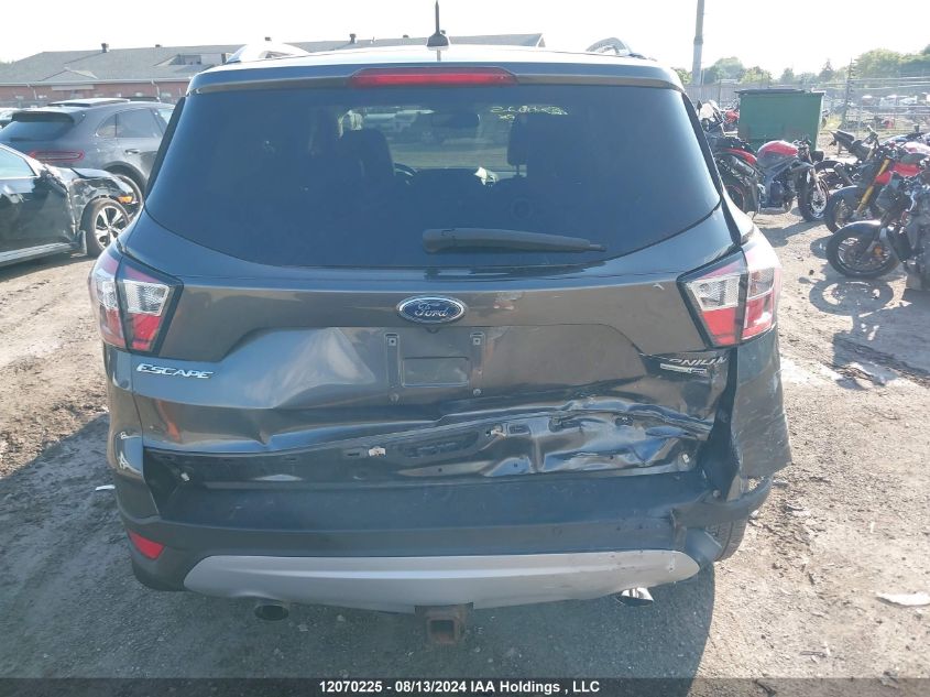 2017 Ford Escape Titanium VIN: 1FMCU9J9XHUC90945 Lot: 12070225