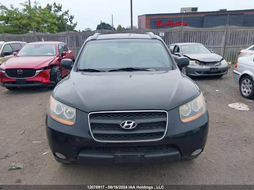 2009 Hyundai Santa Fe VIN: 5NMSG73E69H235018 Lot: 12070917