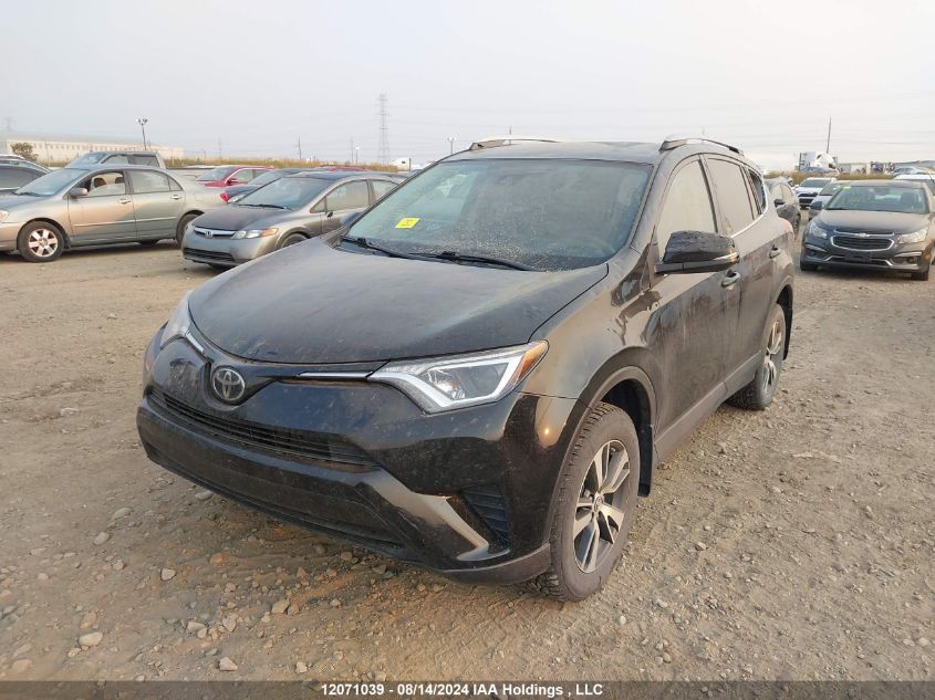 2018 Toyota Rav4 Le VIN: 2T3BFREV3JW825138 Lot: 12071039