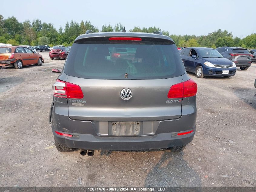 2014 Volkswagen Tiguan VIN: WVGHV3AX8EW579014 Lot: 12071478