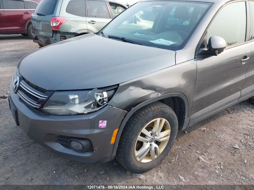 2014 Volkswagen Tiguan VIN: WVGHV3AX8EW579014 Lot: 12071478