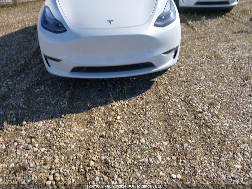 2024 Tesla Model Y VIN: 7SAYGAEE7RF067740 Lot: 12071662