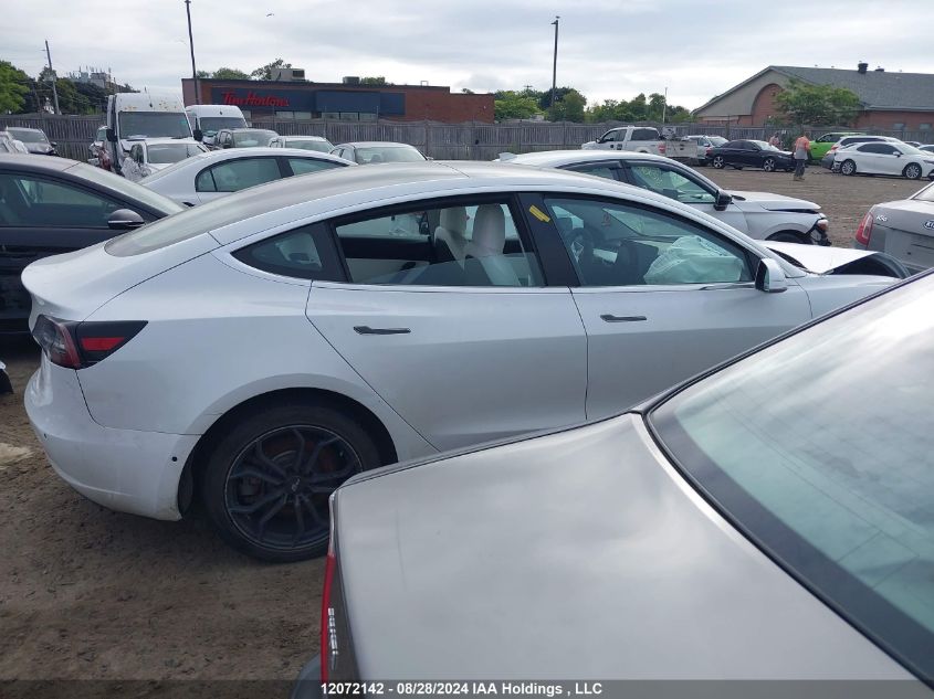 2019 Tesla Model 3 VIN: 5YJ3E1EB0KF423311 Lot: 12072142