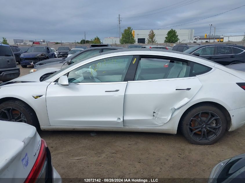 2019 Tesla Model 3 VIN: 5YJ3E1EB0KF423311 Lot: 12072142