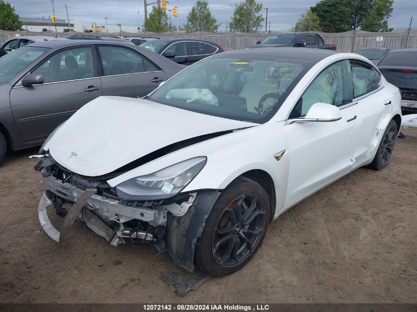 2019 Tesla Model 3 VIN: 5YJ3E1EB0KF423311 Lot: 12072142