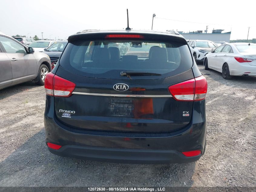 2014 Kia Rondo VIN: KNAHU8A35E7008590 Lot: 12072630