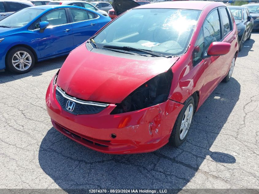 2012 Honda Fit VIN: LUCGE8H59C3000561 Lot: 12074370