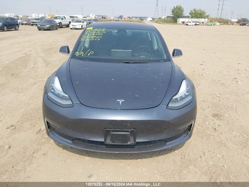 2018 Tesla Model 3 Long Range/Mid Range VIN: 5YJ3E1EA7JF028774 Lot: 12075252