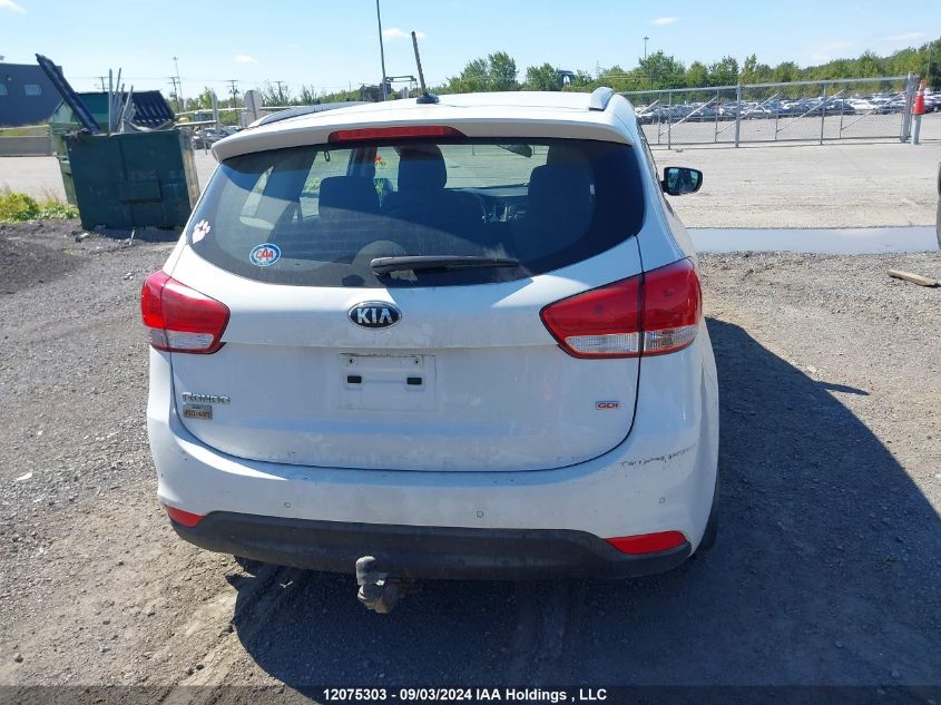 2014 Kia Rondo VIN: KNAHT8A3XE7065323 Lot: 12075303